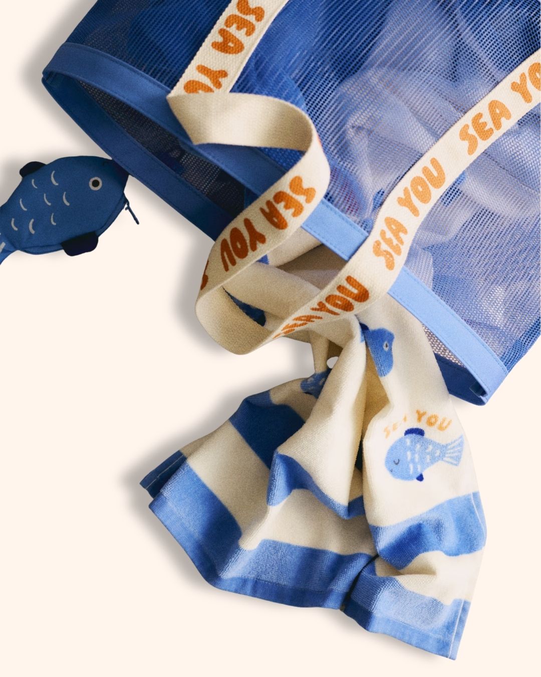 Blue Fish Bath Towel for children, photographic view, available from Melly's World in Lebanon