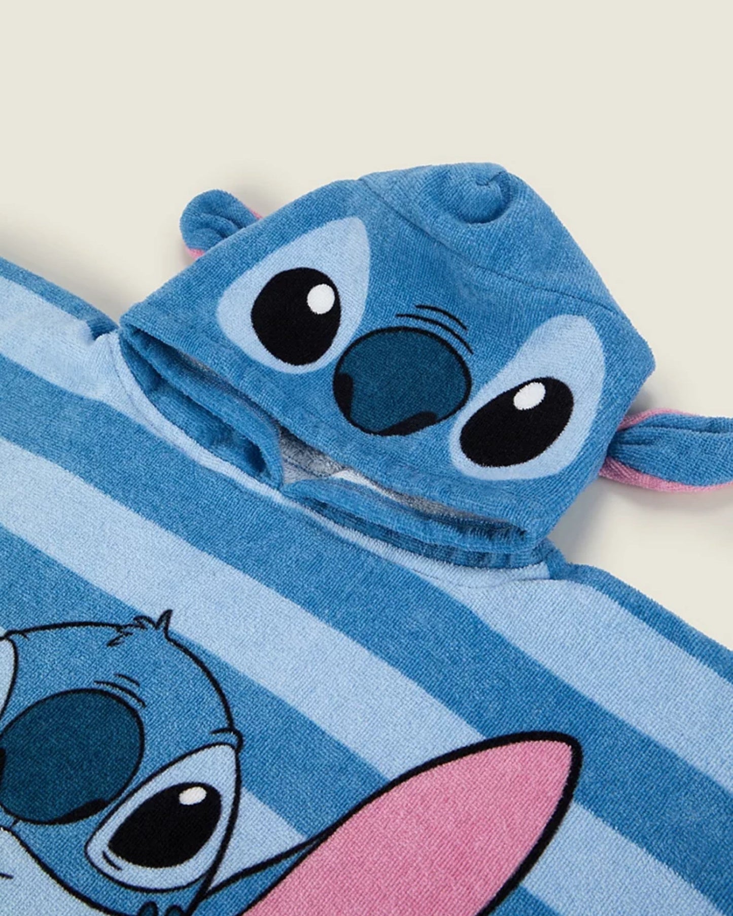 Disney Stitch Print Cotton Poncho for children, detail view, available from Melly's World in Lebanon